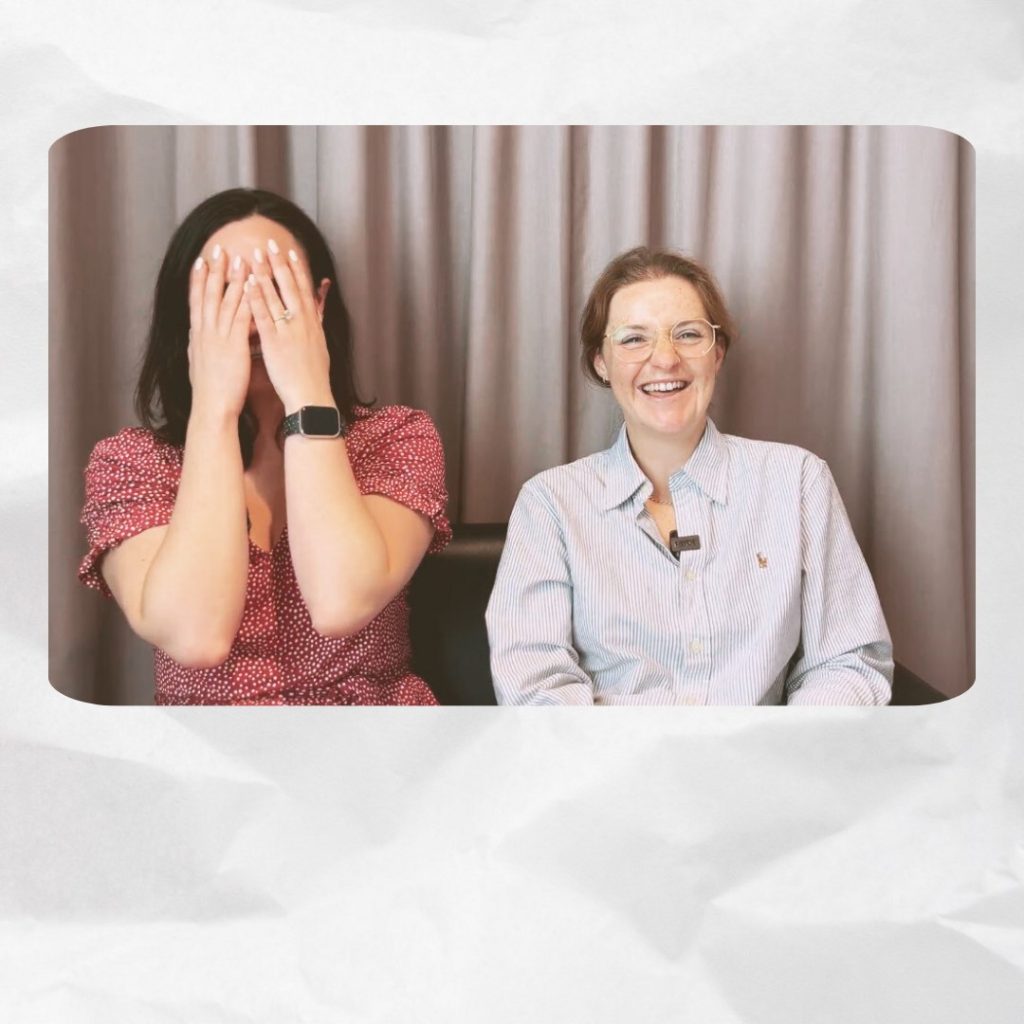 Cara Bezzina and Lisa-Jayne Edwards laughing, Cara covers her face with her hands.